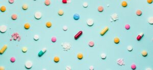 vitamins on a blue background