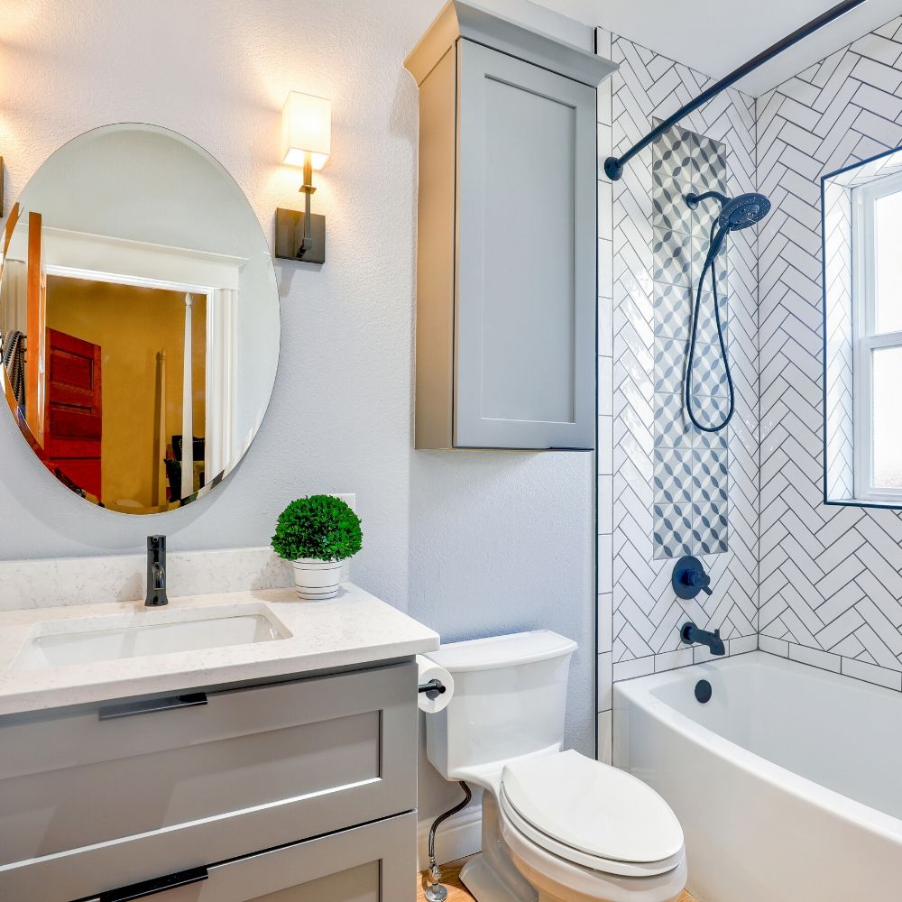 white bathroom with shower over the bath