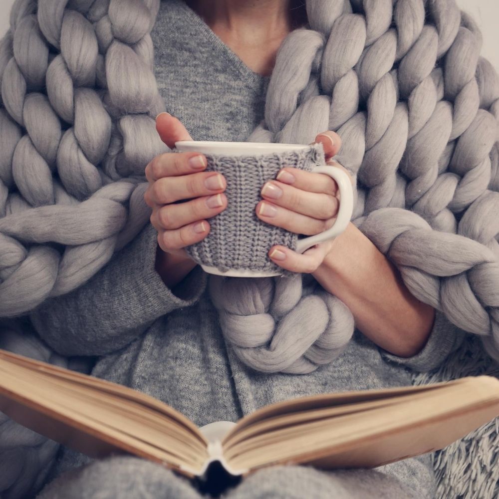 person wrapped in a blanket