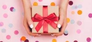 Someone holding a present
