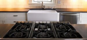 kitchen featuring a close up of a cooker