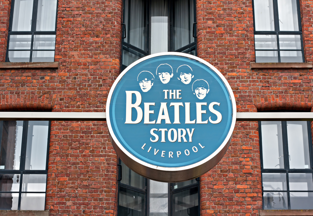 The Beatles Story Exhibition Sign, at Albert Dock, Liverpool, UK. A popular tourist attraction.
