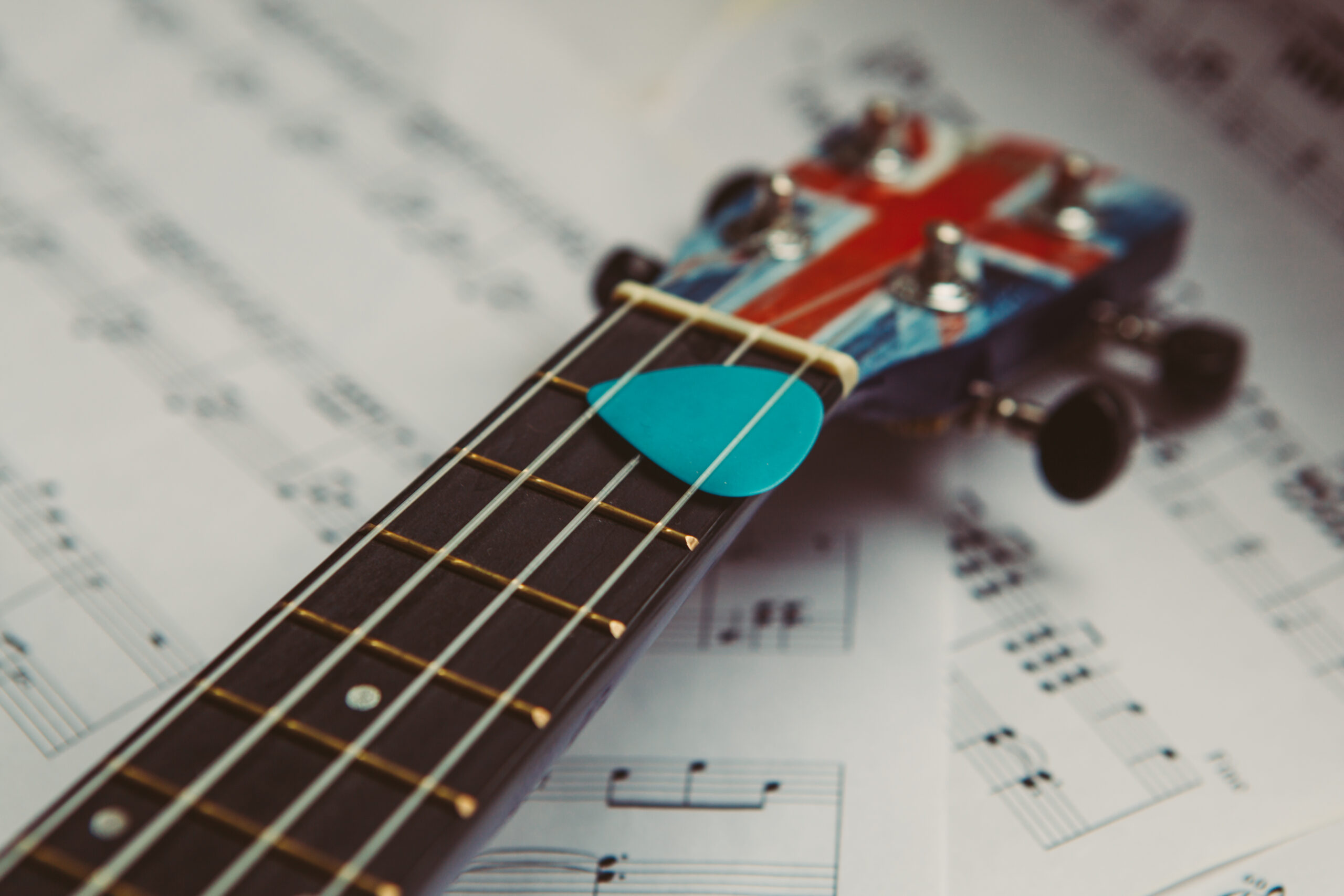 Ukulele and music notes sheet