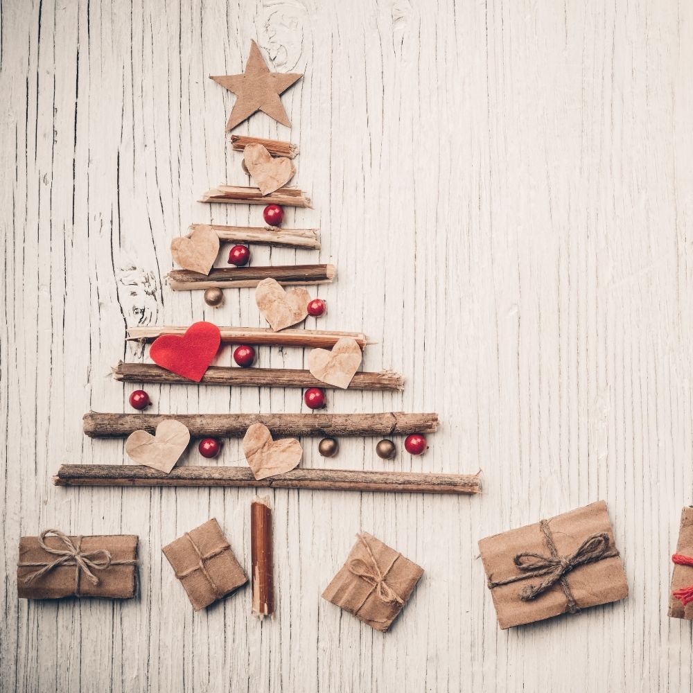 diftwood tree with presents under