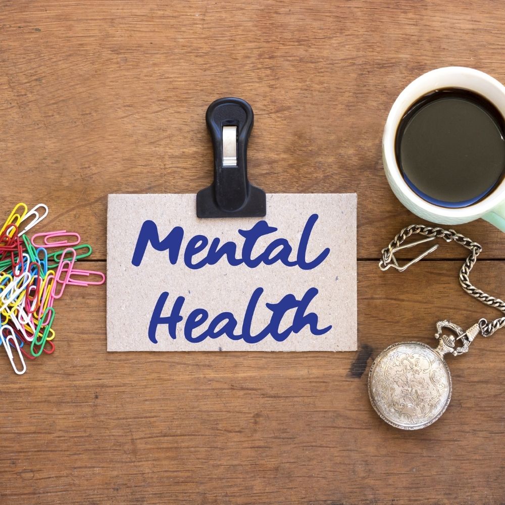 mental health written on a notelet on a clip