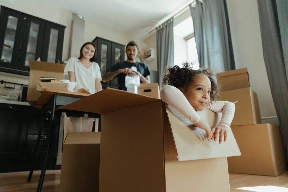 Family packing boxes ready to move