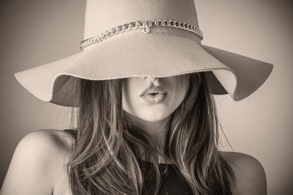 septa image of a women wearing a large brimmed hat