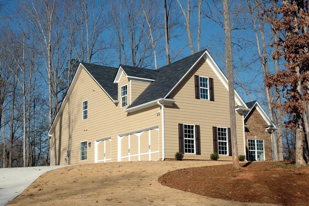 Picture of a large house at the end of a path