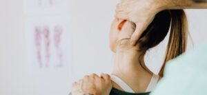 Chiropractor working on a womens neck