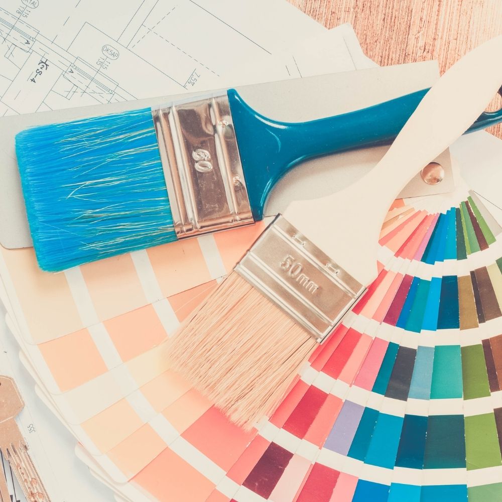 paint brushes and colour charts
