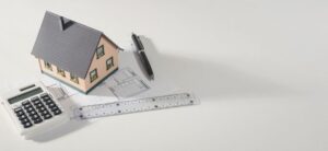 home calculator ruler and pen