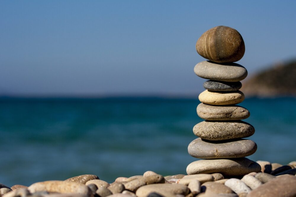 rocks stacked on the seafront