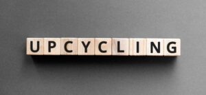 upcycling spelt out using scrabble tiles