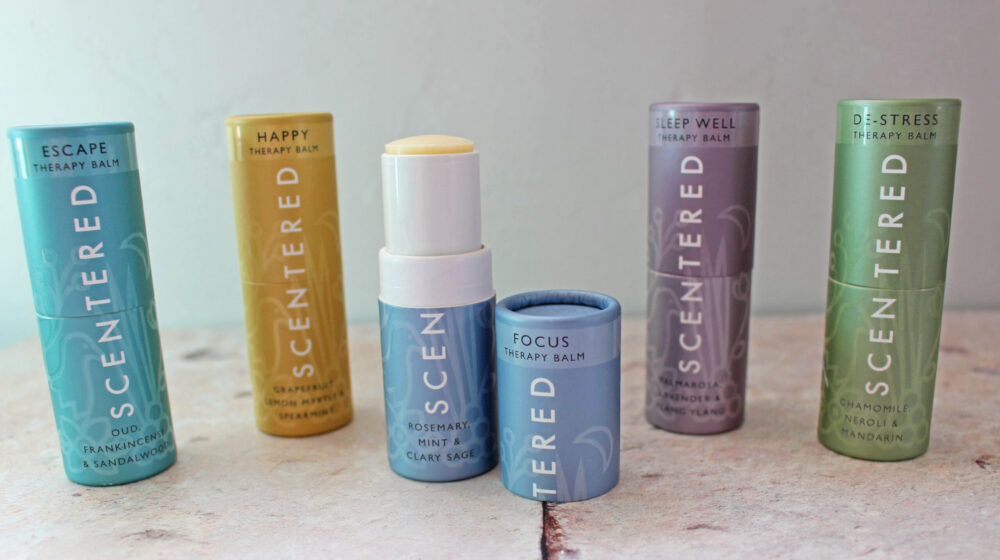Scentered Signature Ritual Collection Balms stood in a row with one open