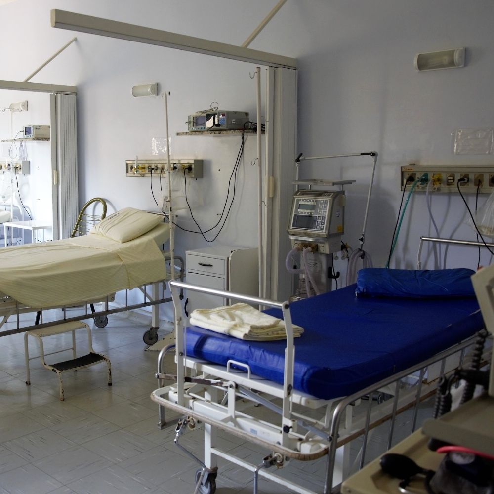 hospital beds in a ward