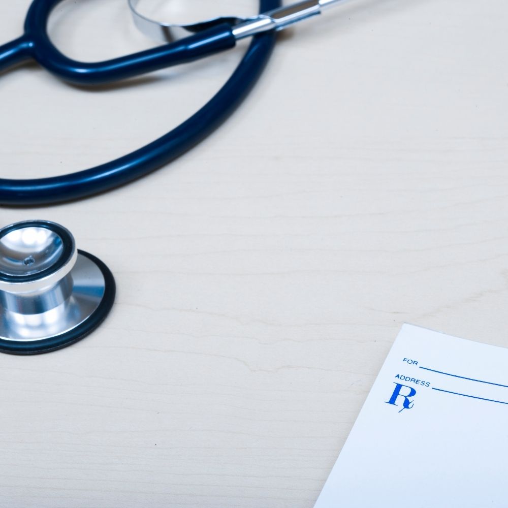 stethoscope and hospital notes
