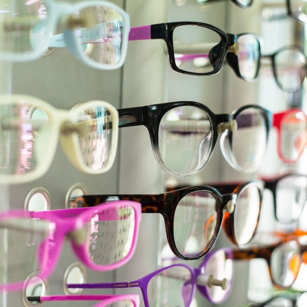 selection of glasses frames on a rack