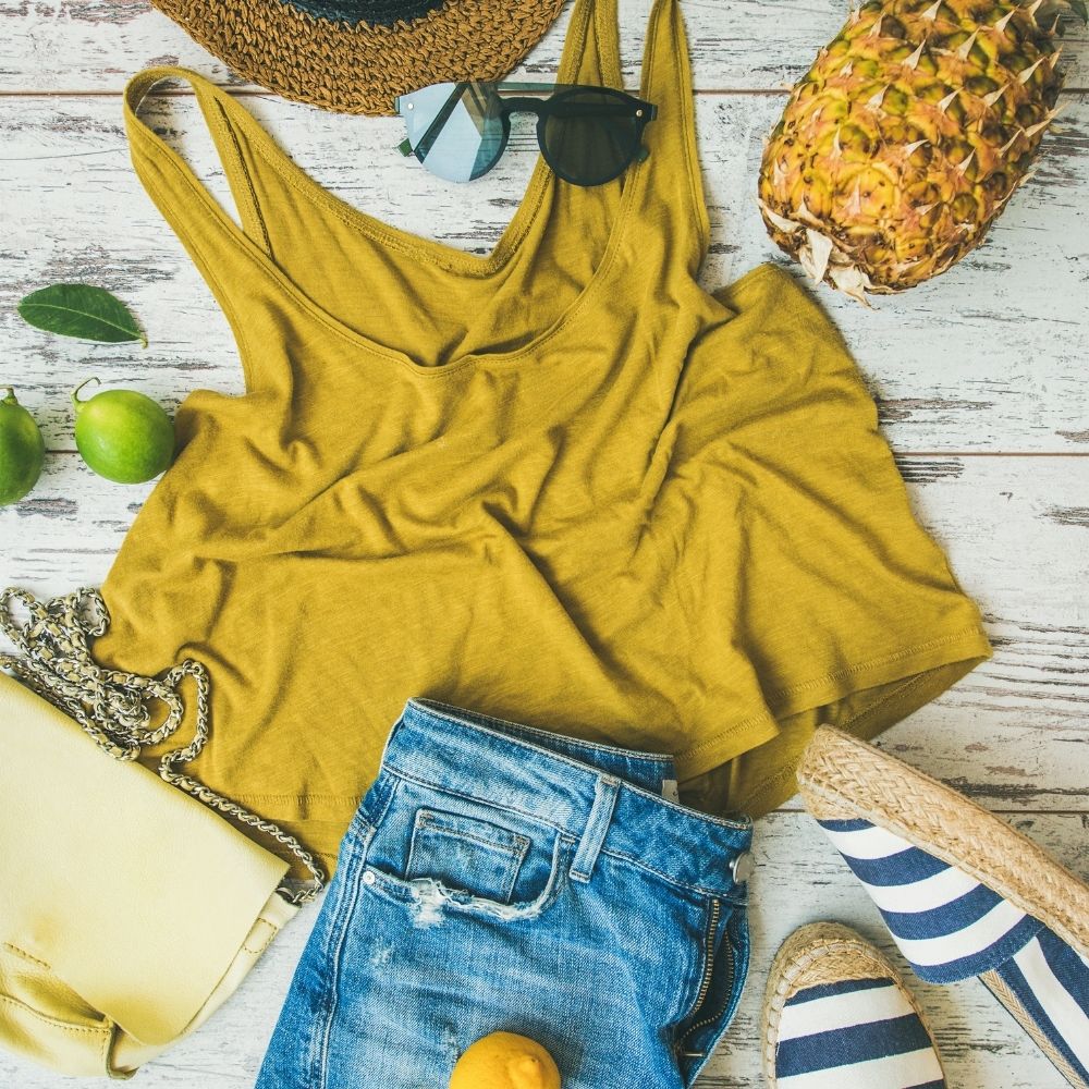 summer outfit mustard top jeans sunglasses and shoes and top