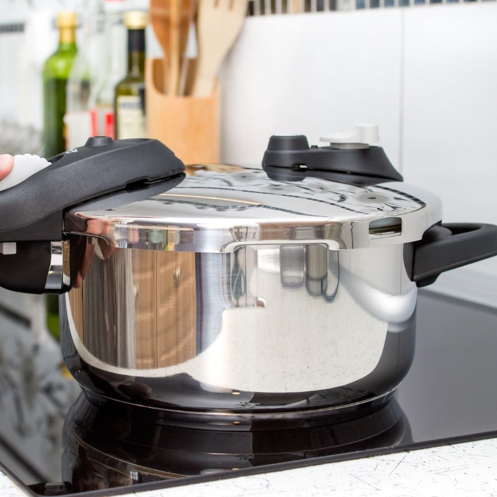 pressure cooker with safety cover
