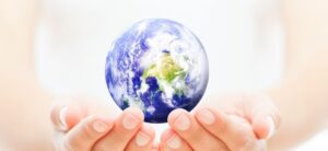 image of a planet in someones hands