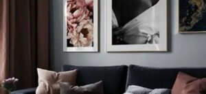 prints on wall above a sofa from desenio