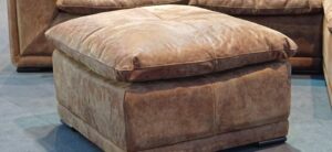 big leather footstool in a living room