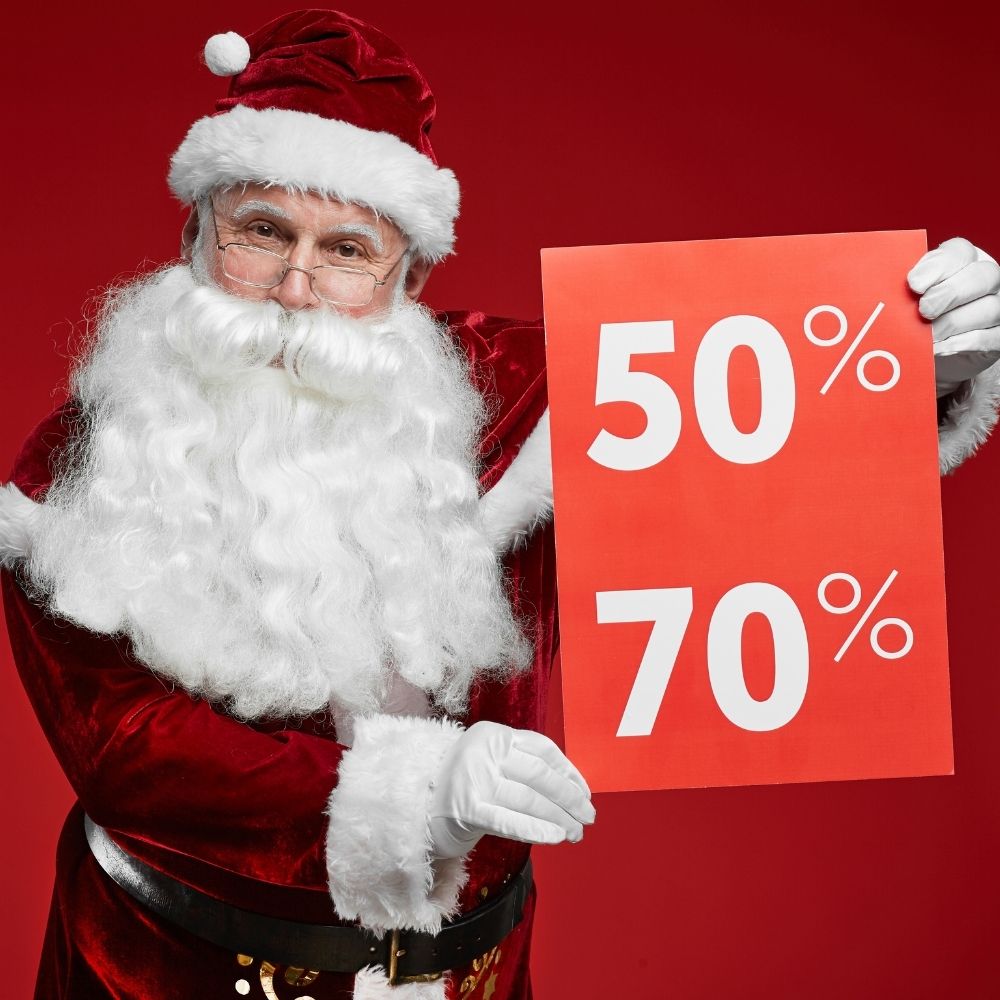 santa holding a sign that says 50 and 70 percent off