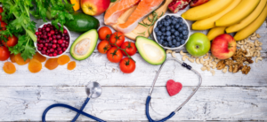 fruit and veg with a stethoscope with a red heart