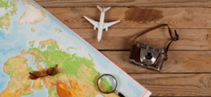map model plane camera and magnifying glass