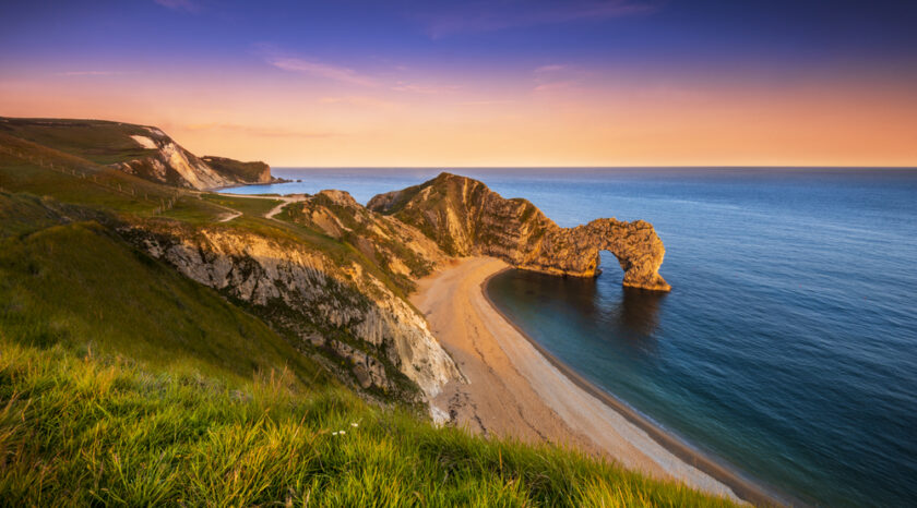 The sun goes down on the Jurassic coast and Durdle Door in Dorset