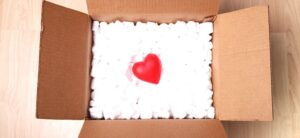red love heart packed up in a box image