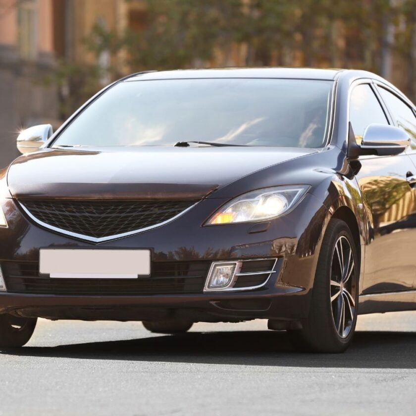luxury black car photographed outside