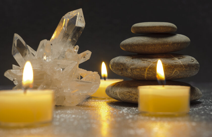 quartz crystal and zen stones with candles