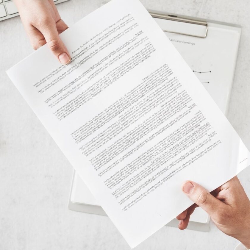 business people exchanging a contract