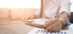 business person analysing a chart