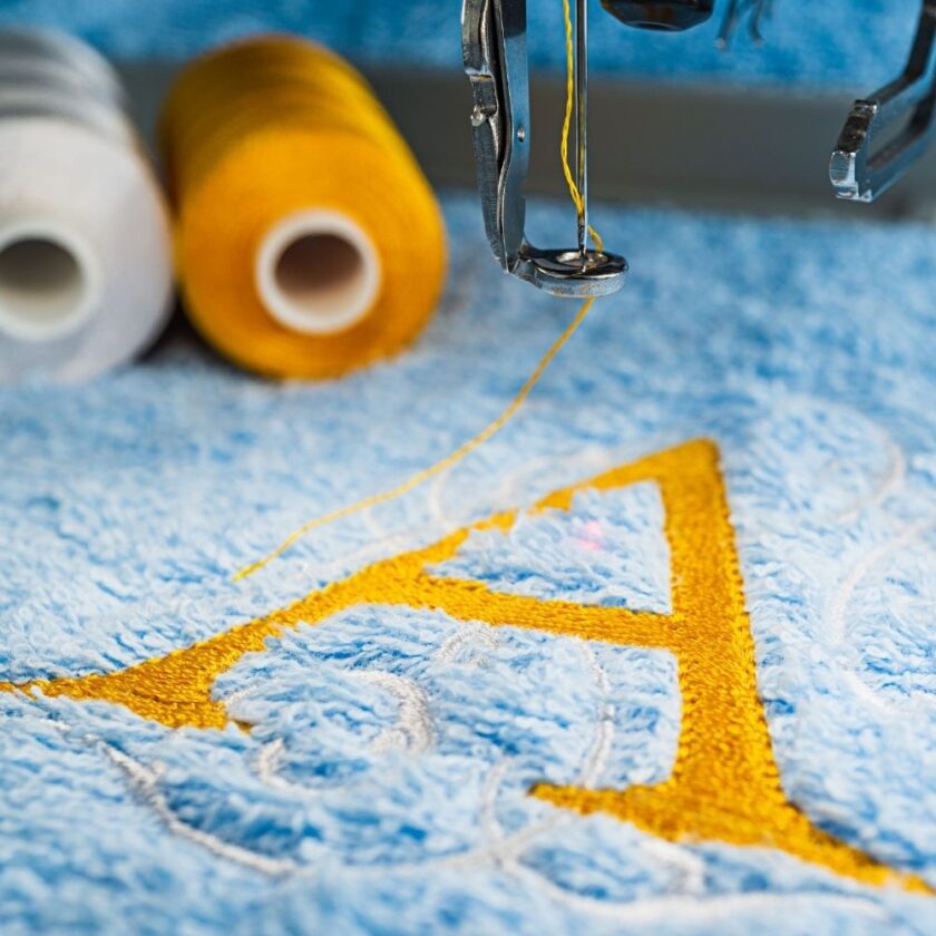 letter A embroidered in yellow