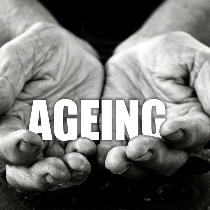 person holding the words ageing