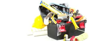 toolbox filled with tools against a white backdrop