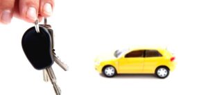 yellow car and car keys