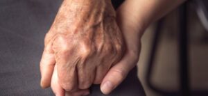 youthful hand and elderly hand