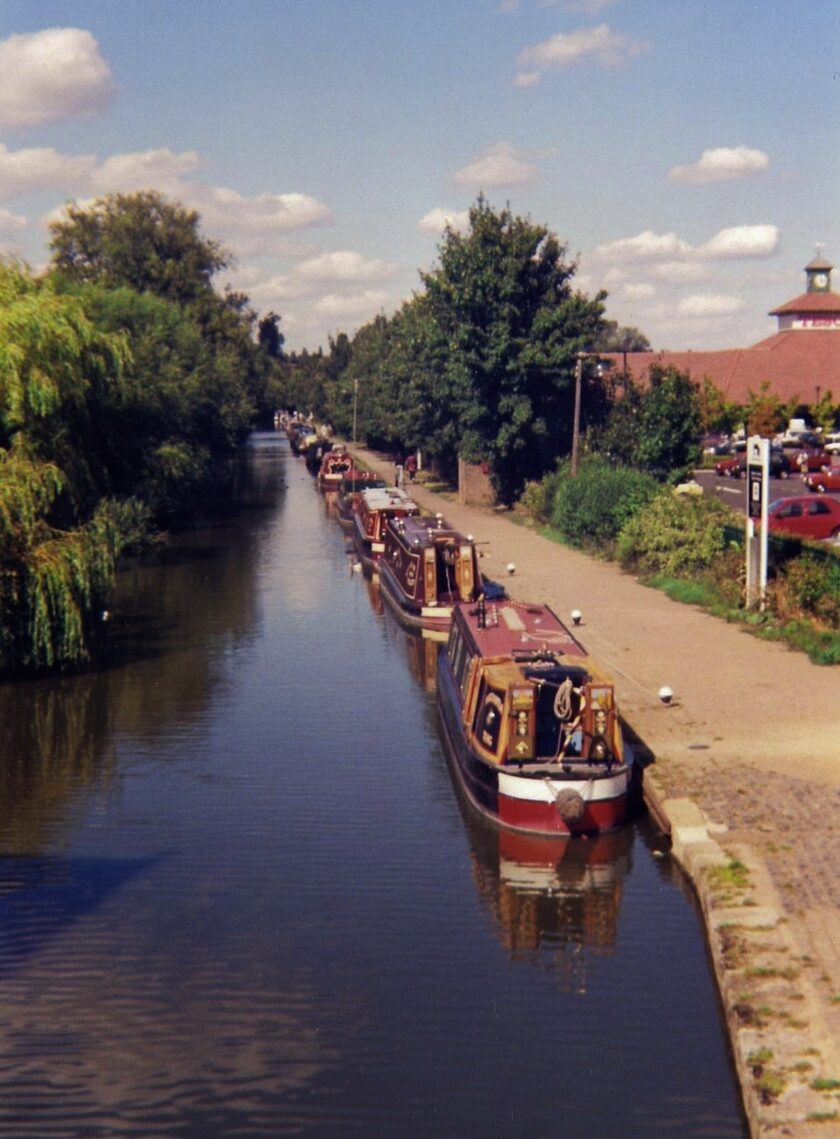 A row of boats on a canal