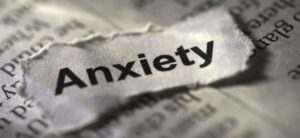 piece of paper ripped out a book saying anxiety