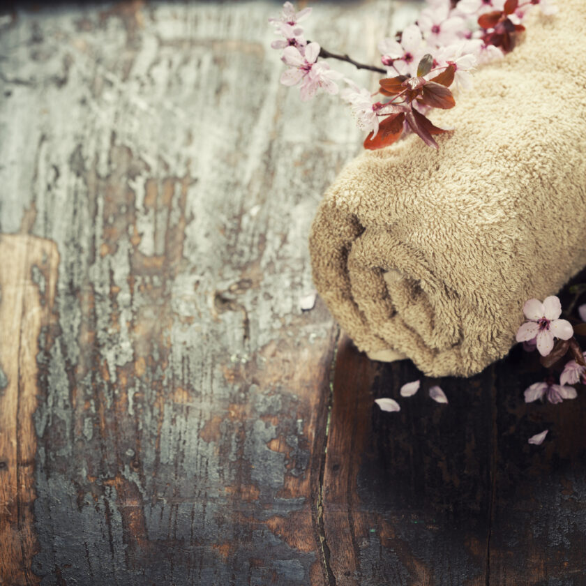 Spa setting on old wooden board