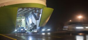 cars being unloaded from a ship