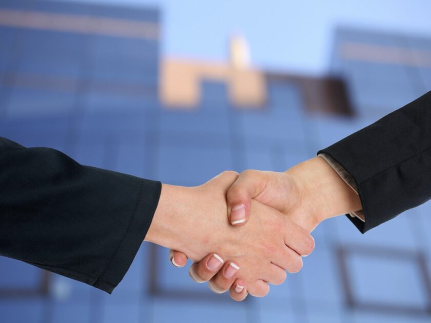 two business people shaking hands