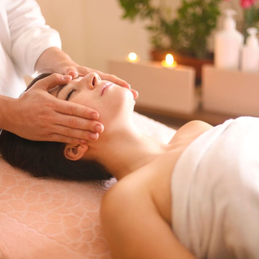 woman having a head or face massage 