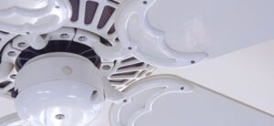 close up of a white ceiling fan