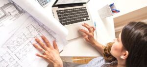 female architect working on plans