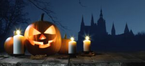 halloween card with pumpkin and candles