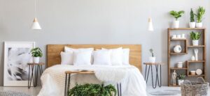 light colour bedroom with lots of plants image licensed